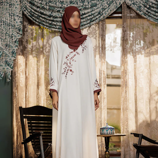 عباية كريمية مطرّزة